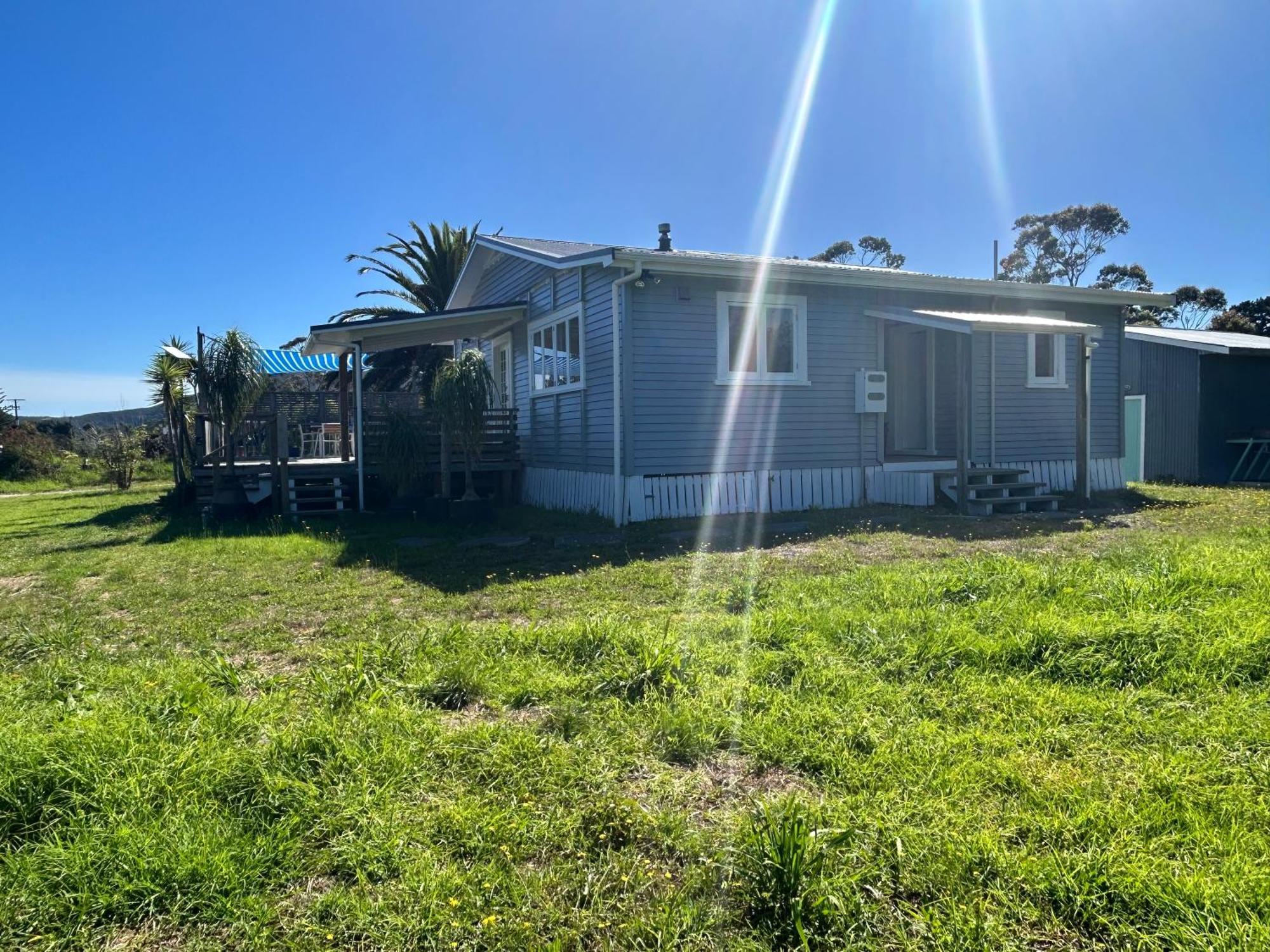 Green Turtle Cottage Pukenui Esterno foto